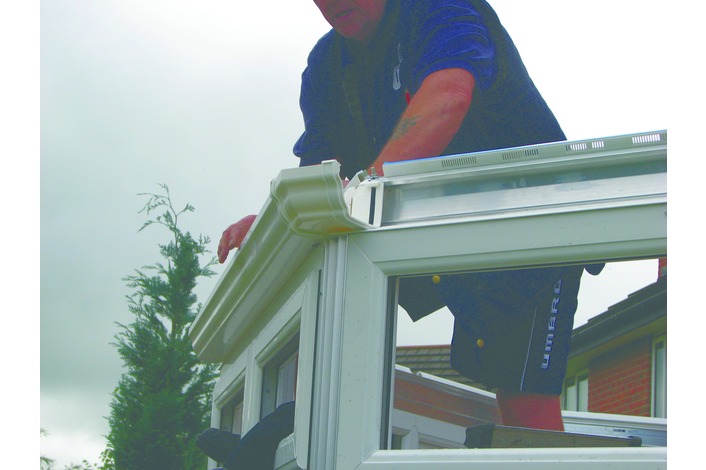 The guttering is fitted into position including any down pipes.