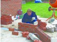 Using bricks to match the existing house brickwork the remaining dwarf walls for the conservatory are constructed in accordance with the base plans.