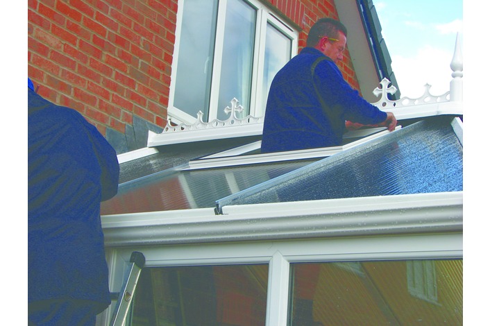 If selected at time of order, opening roof vents are installed into the glazing apertures.