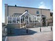 T Shape conservatory with sunburst gable